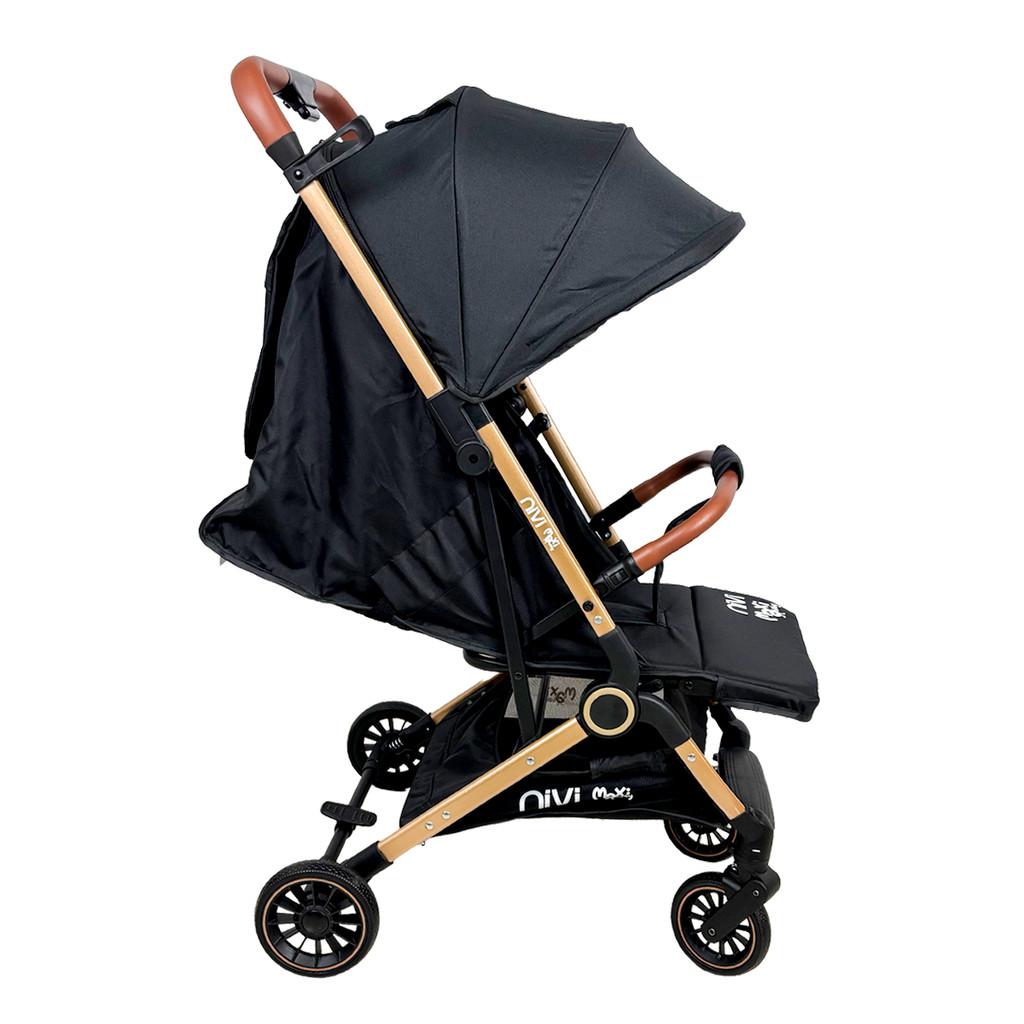 Carrinho Bebe Passeio Reclinável Vira Berco Leve Dobrável Compacto Nivi Maxi Baby