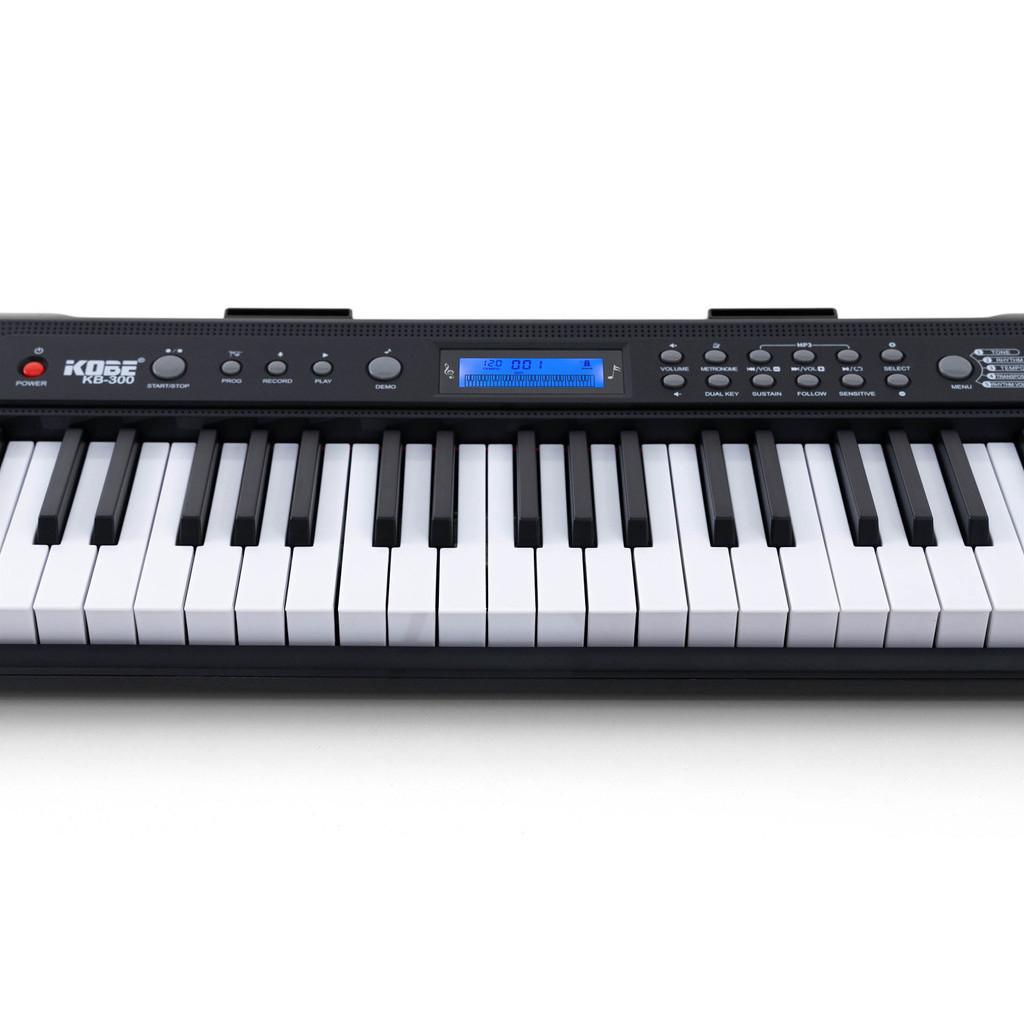 Kit Teclado Musical Eletrônico Kobe Kb-300 5/8 Teclas Sensíveis Incluso Pedal Sustain E Suporte