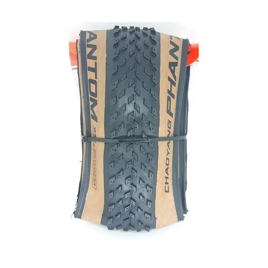 Par Pneu Chaoyang Phantom Wet 29x2.20 2c Tubeless Kevlar Sem Arame Preto C/Bege Mtb